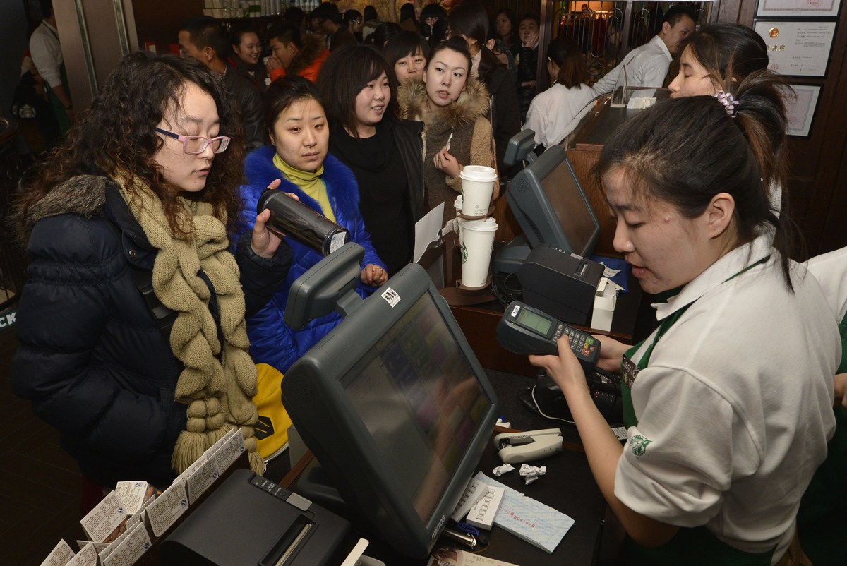 山西首家星巴克店火爆开业队排到马路对面组图