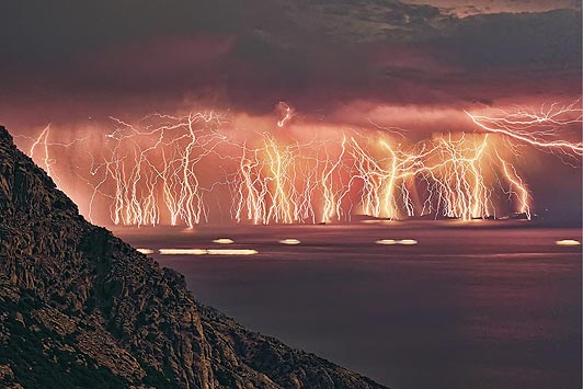 a severe storm as it passes the island of Ikaria. 